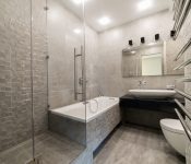 Bathroom with grey stoned wall