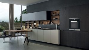 Corner of white, black panoramic kitchen with bar stools, and wooden elements