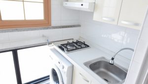 Picture of a laundry room with wooden tilings