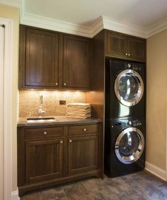 laundry room with wood cabinets